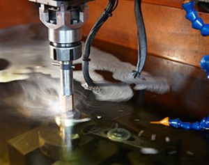 Electrical discharge machining of metal parts