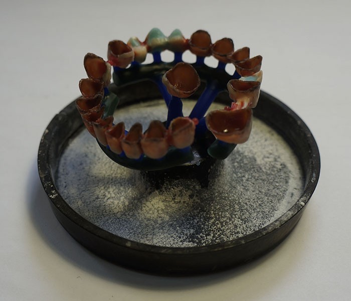 Centrifugal and vacuum casting of dental products